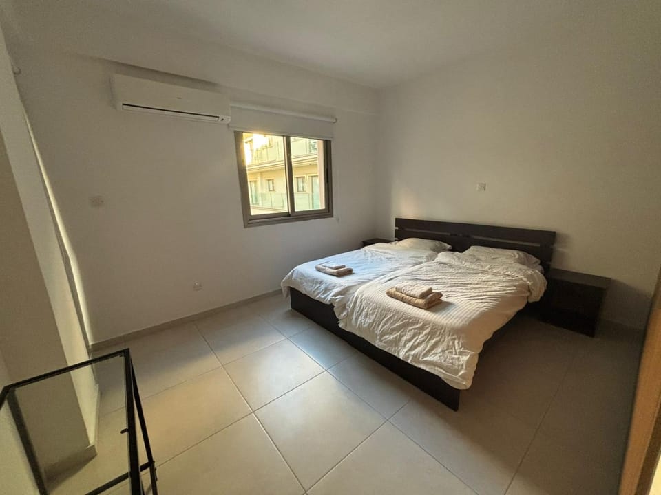 Bed, Photo of the whole room, Bedroom, towels, air conditioner