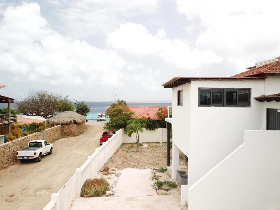 Property building, Day, Neighbourhood, Natural landscape, Beach, Sea view, Parking