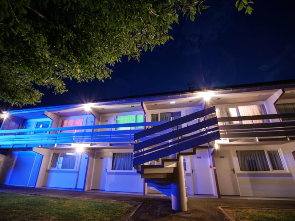 Property building, Facade/entrance, Night, Property logo or sign