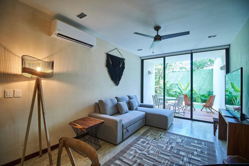 TV and multimedia, Living room, Seating area, fireplace, air conditioner
