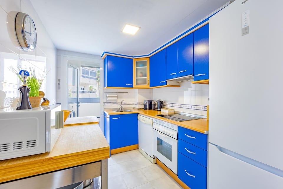 Kitchen or kitchenette, dishwasher, oven, stove, toaster
