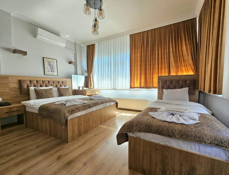 Bed, Photo of the whole room, Bedroom, towels, air conditioner