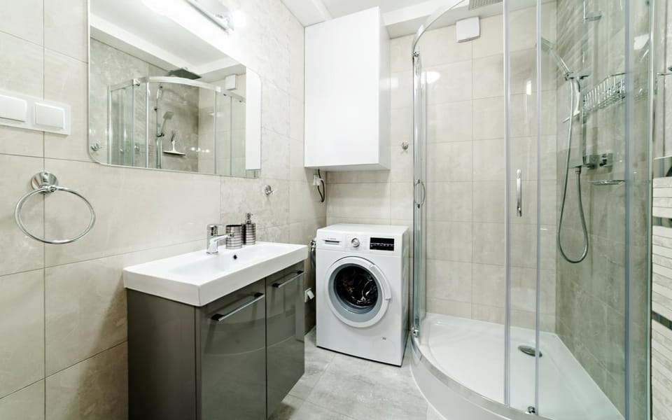 Shower, Toilet, Bathroom, fireplace, heating, towels, washing machine