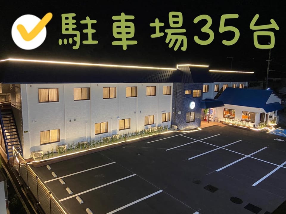 Property building, Night, Property logo or sign, Parking