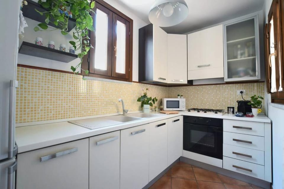 Kitchen or kitchenette, oven, stove
