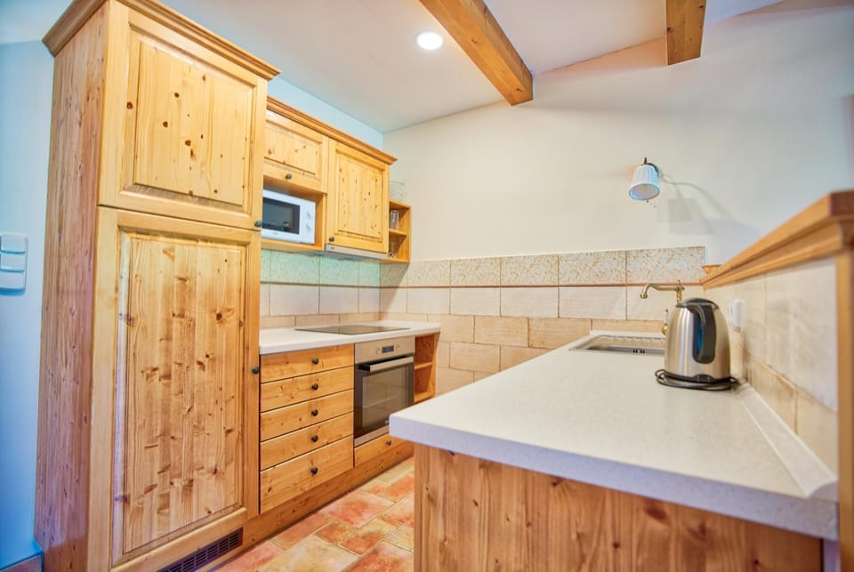 Kitchen or kitchenette, oven, stove