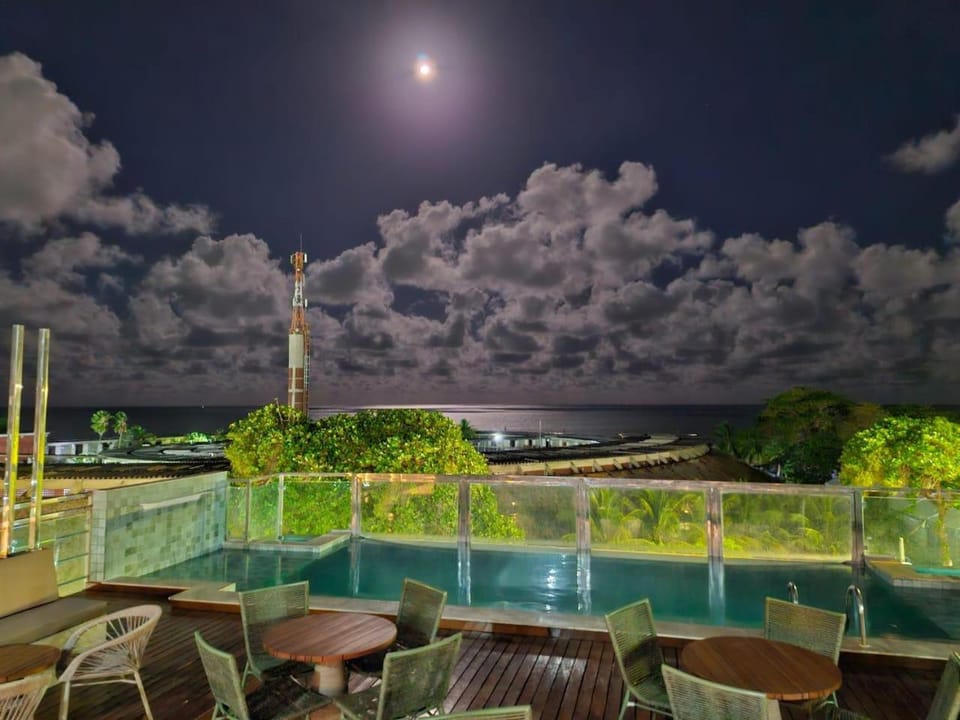 Night, View (from property/room), Pool view, Swimming pool