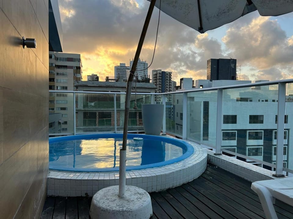 Swimming pool, sunbed