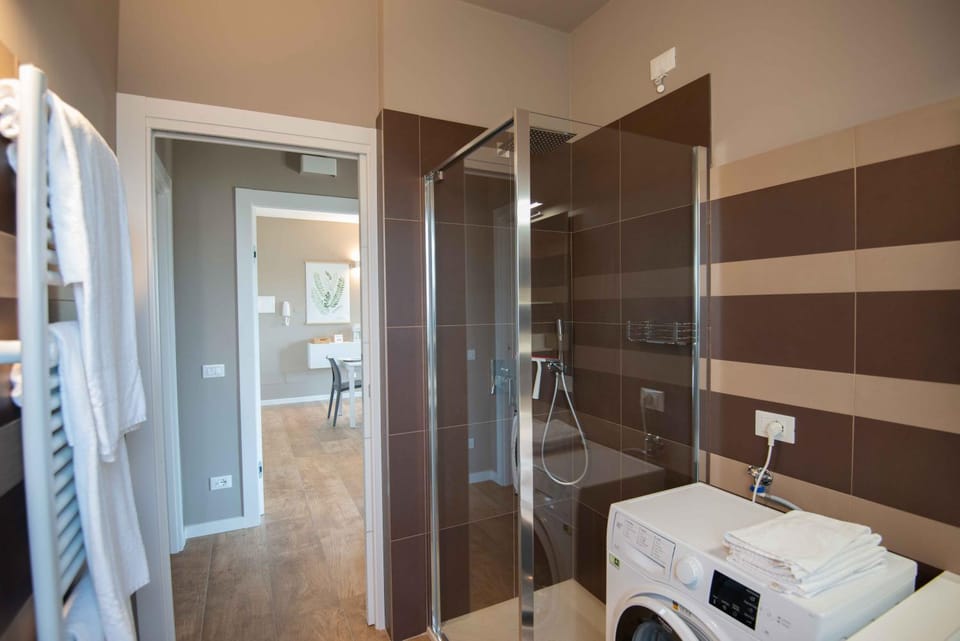 Shower, Bathroom, towels, washing machine, dryer