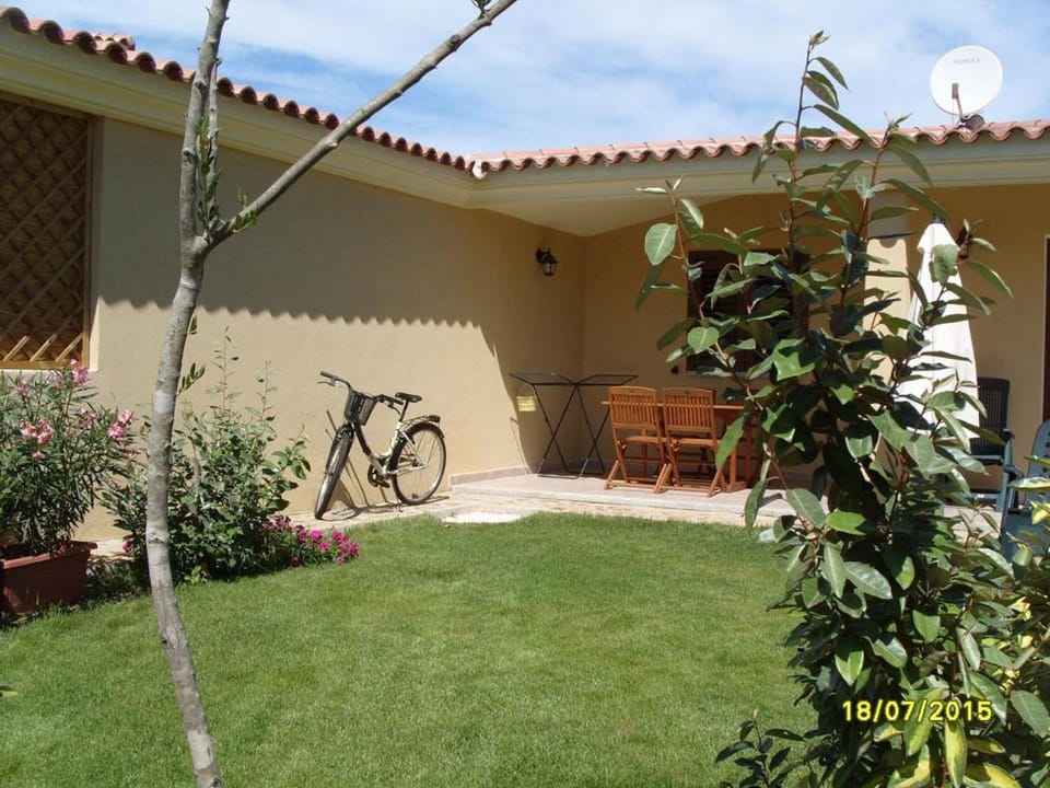 1CASADELFARO con Giardino a Pittulongu 600Metri dalla Spiaggia House in Pittulongu