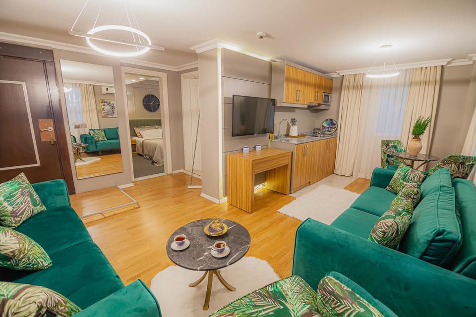 TV and multimedia, Coffee/tea facilities, Kitchen or kitchenette, Living room, Seating area, Dining area, heating, microwave, stove, washing machine, air conditioner