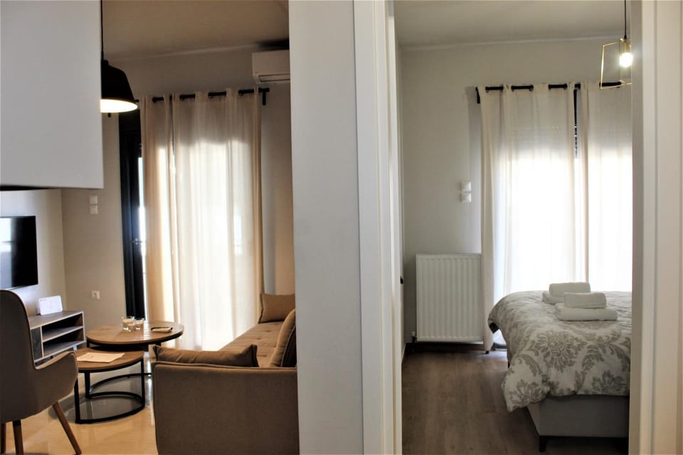 Bed, Living room, Seating area, Bedroom