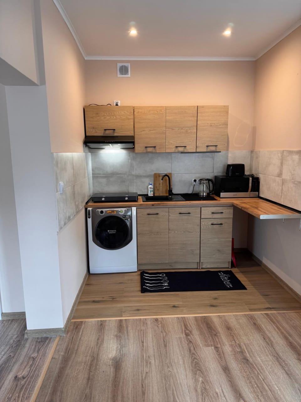 Kitchen or kitchenette, oven, toaster