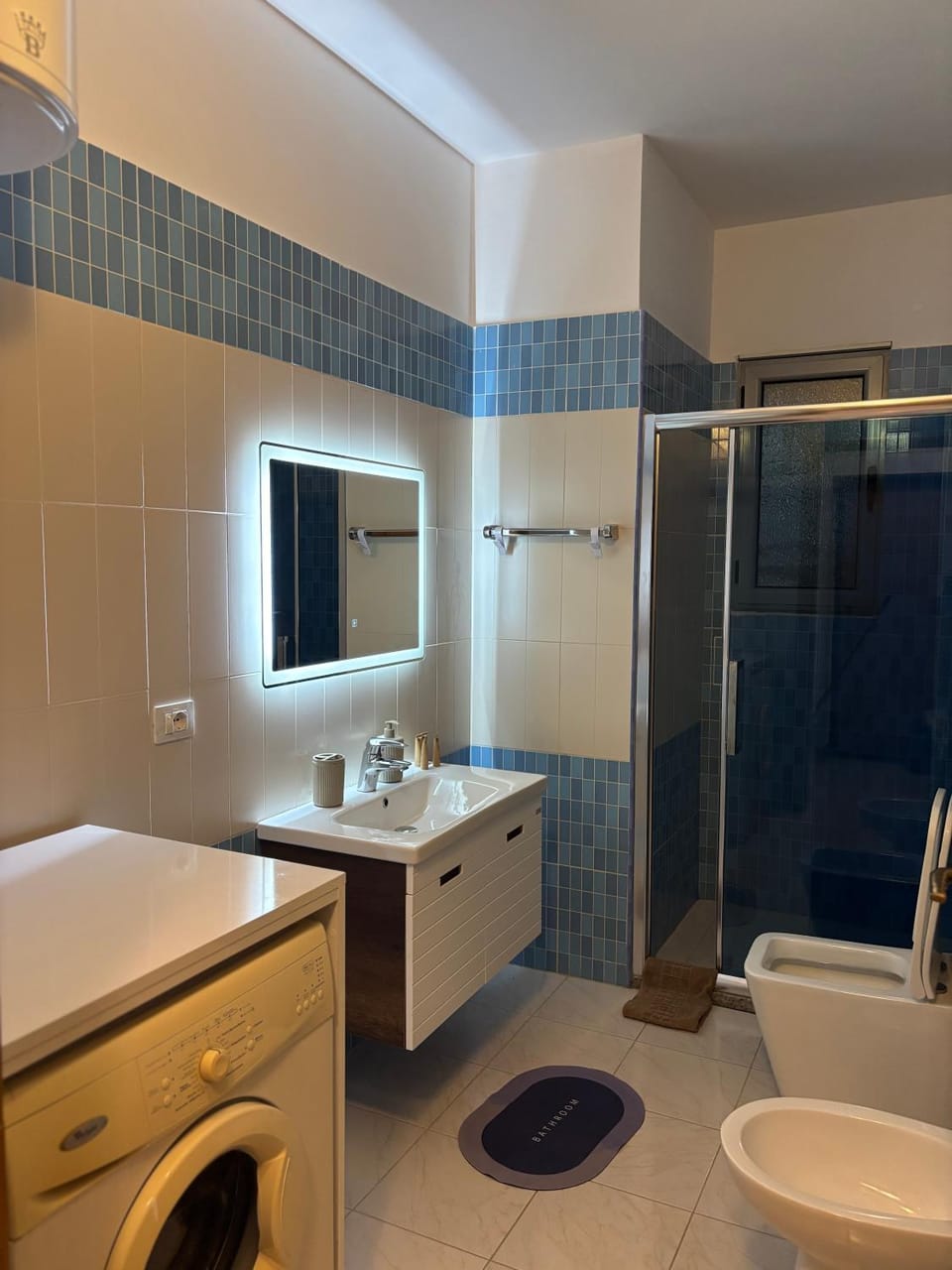 Shower, Toilet, Bathroom, Bath, towels, washing machine, dryer