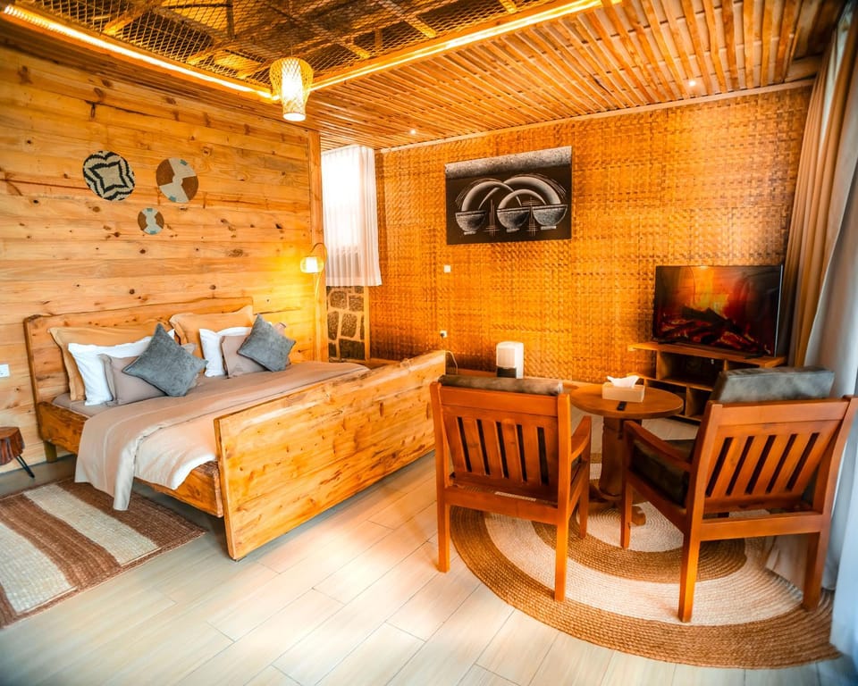 Bed, TV and multimedia, Living room, Photo of the whole room, Seating area, Bedroom