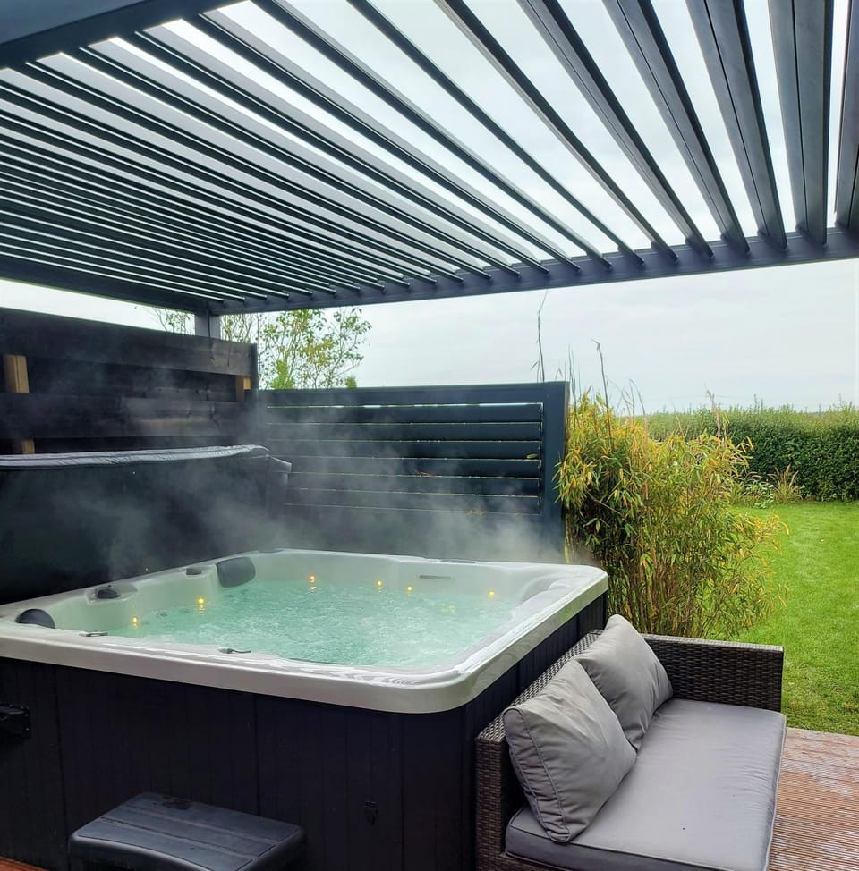 Jacuzzi huisje De Berenshoeve House in Emmen