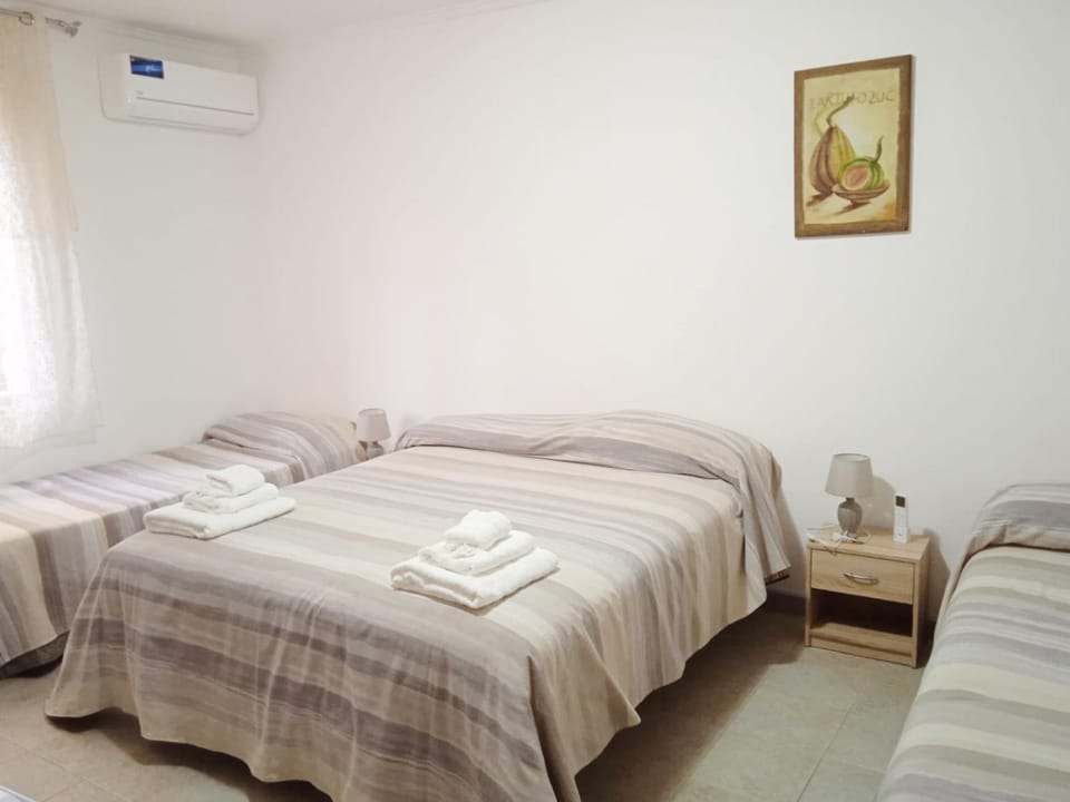 Bed, Photo of the whole room, Bedroom, towels, air conditioner