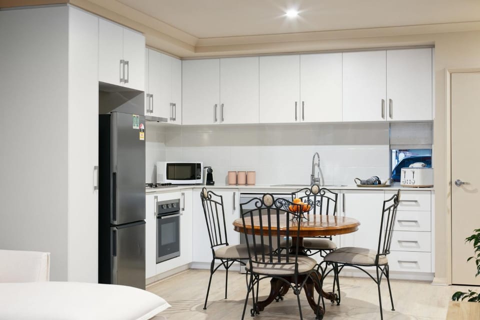 Kitchen or kitchenette, Dining area, dishwasher, oven, stove, toaster