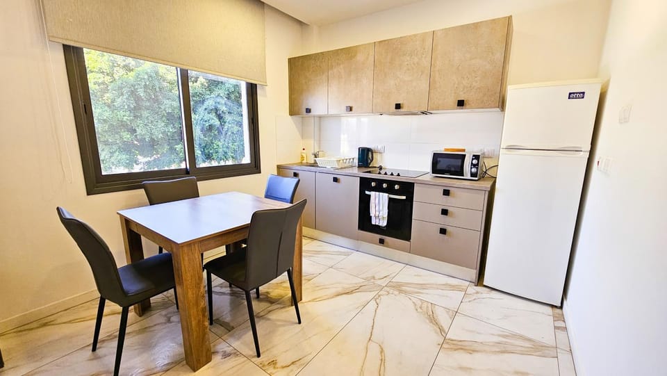Kitchen or kitchenette, Dining area, oven, stove, toaster