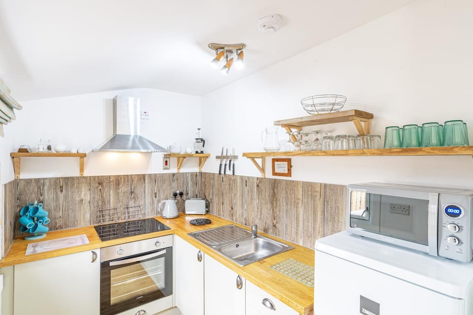 Kitchen or kitchenette, oven, stove, toaster