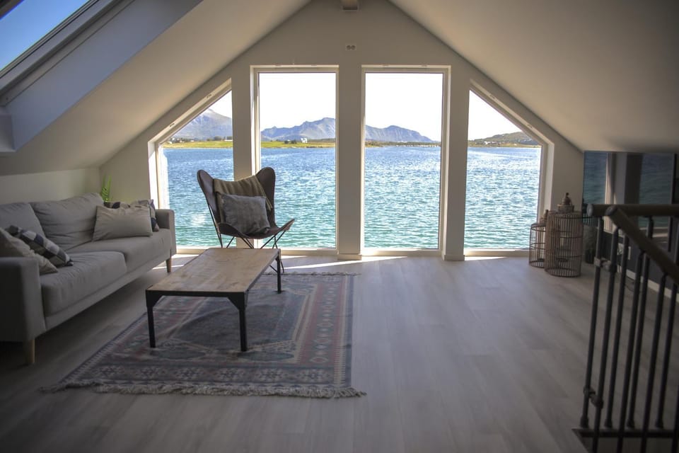 View (from property/room), Living room, Seating area, Mountain view, Sea view