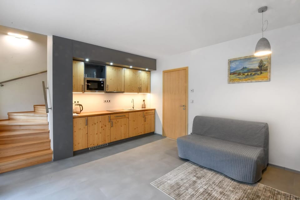 Kitchen or kitchenette, Living room, Seating area, Dining area