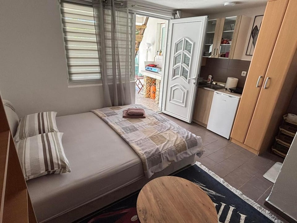 Bed, Kitchen or kitchenette, Bedroom, stove, kitchen, kitchen