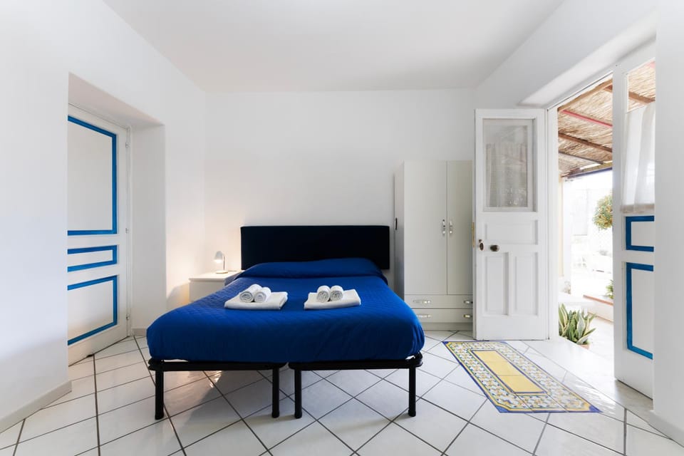 Bed, Photo of the whole room, Bedroom, towels, wardrobe