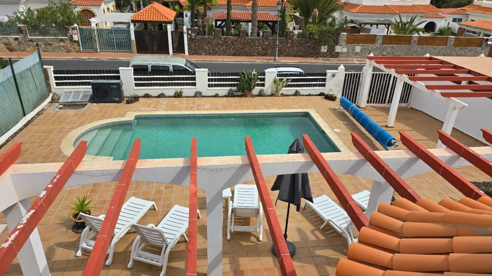 Property building, Patio, Day, View (from property/room), Pool view, Swimming pool, sunbed