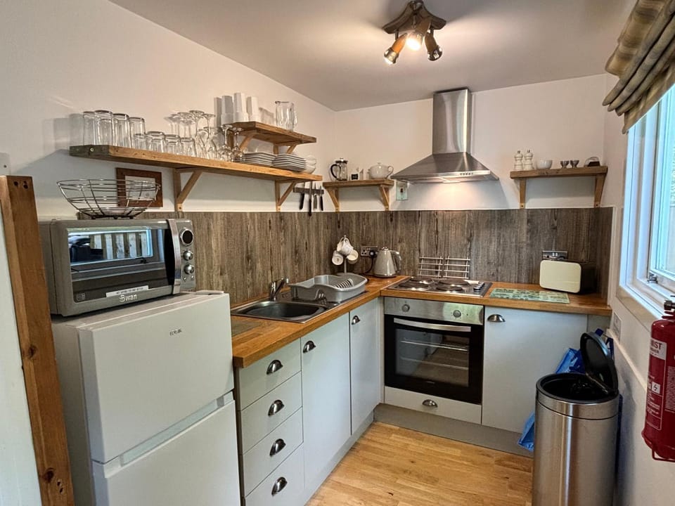 Kitchen or kitchenette, oven, stove