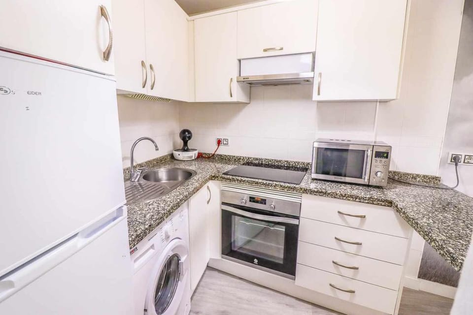 Kitchen or kitchenette, oven, stove