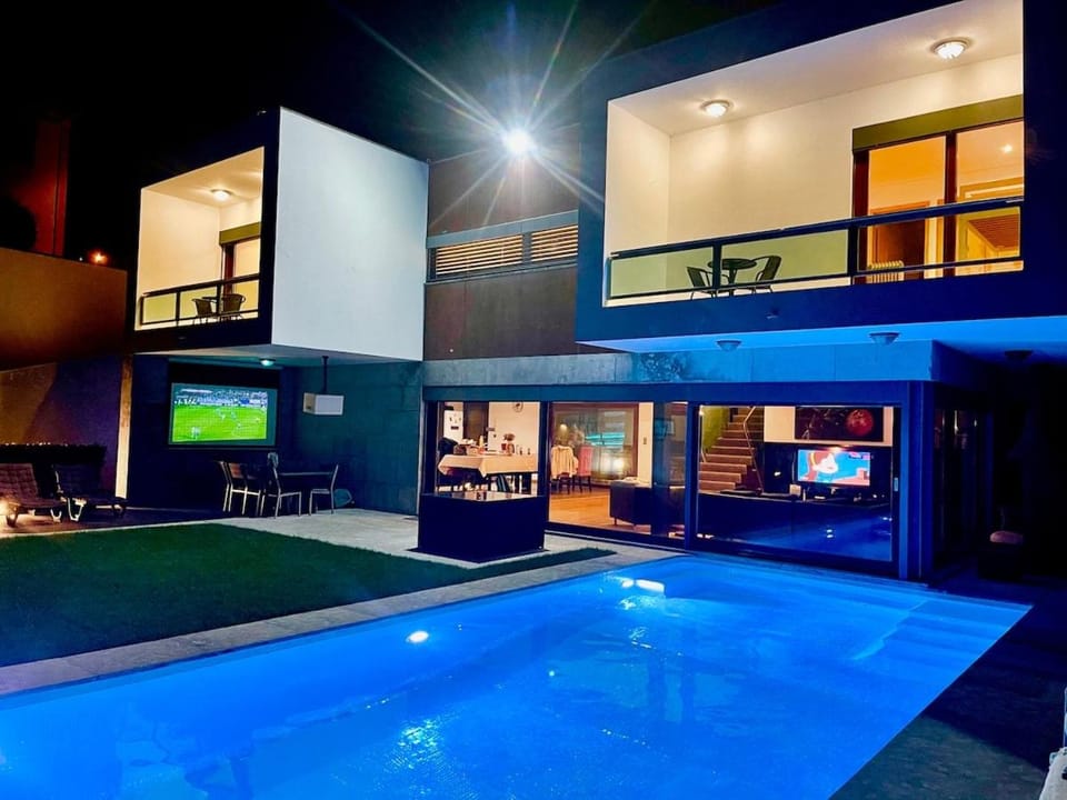 Night, View (from property/room), Swimming pool