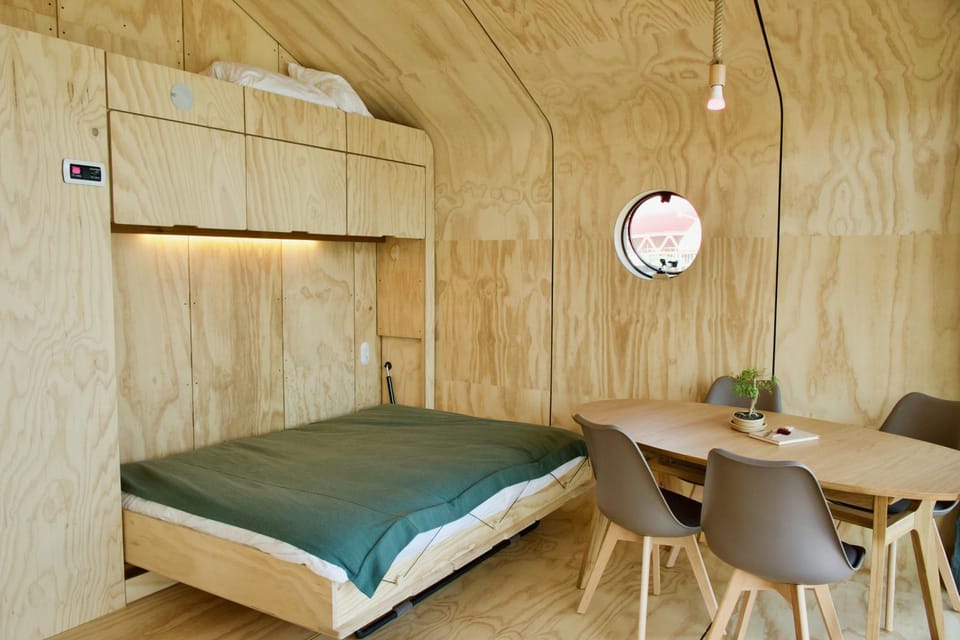 Bed, Living room, Seating area, Bedroom