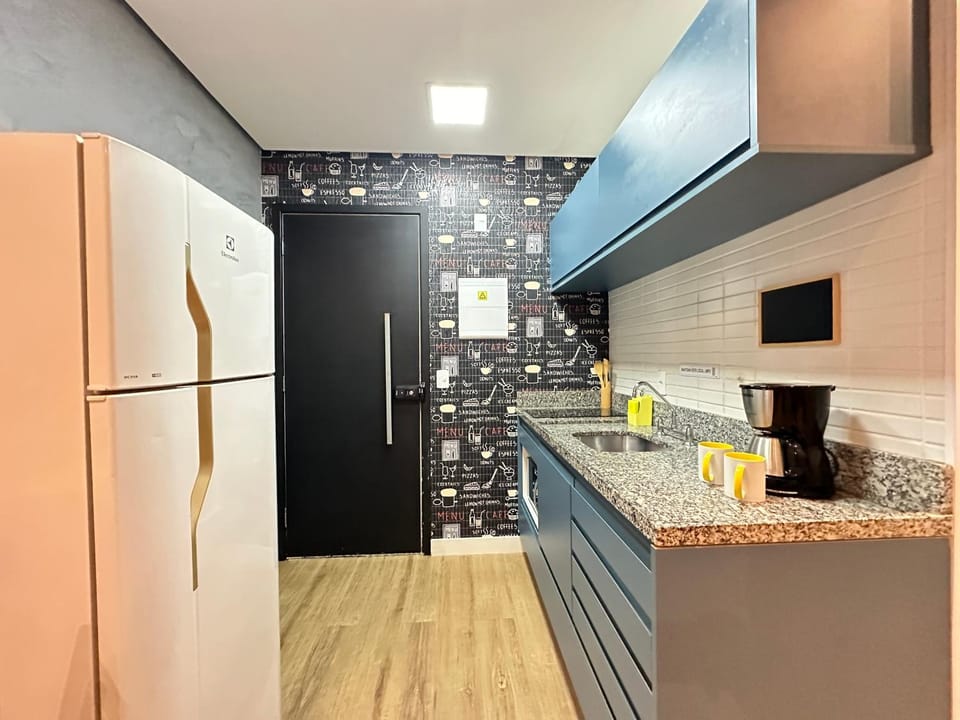Kitchen or kitchenette, microwave, stove