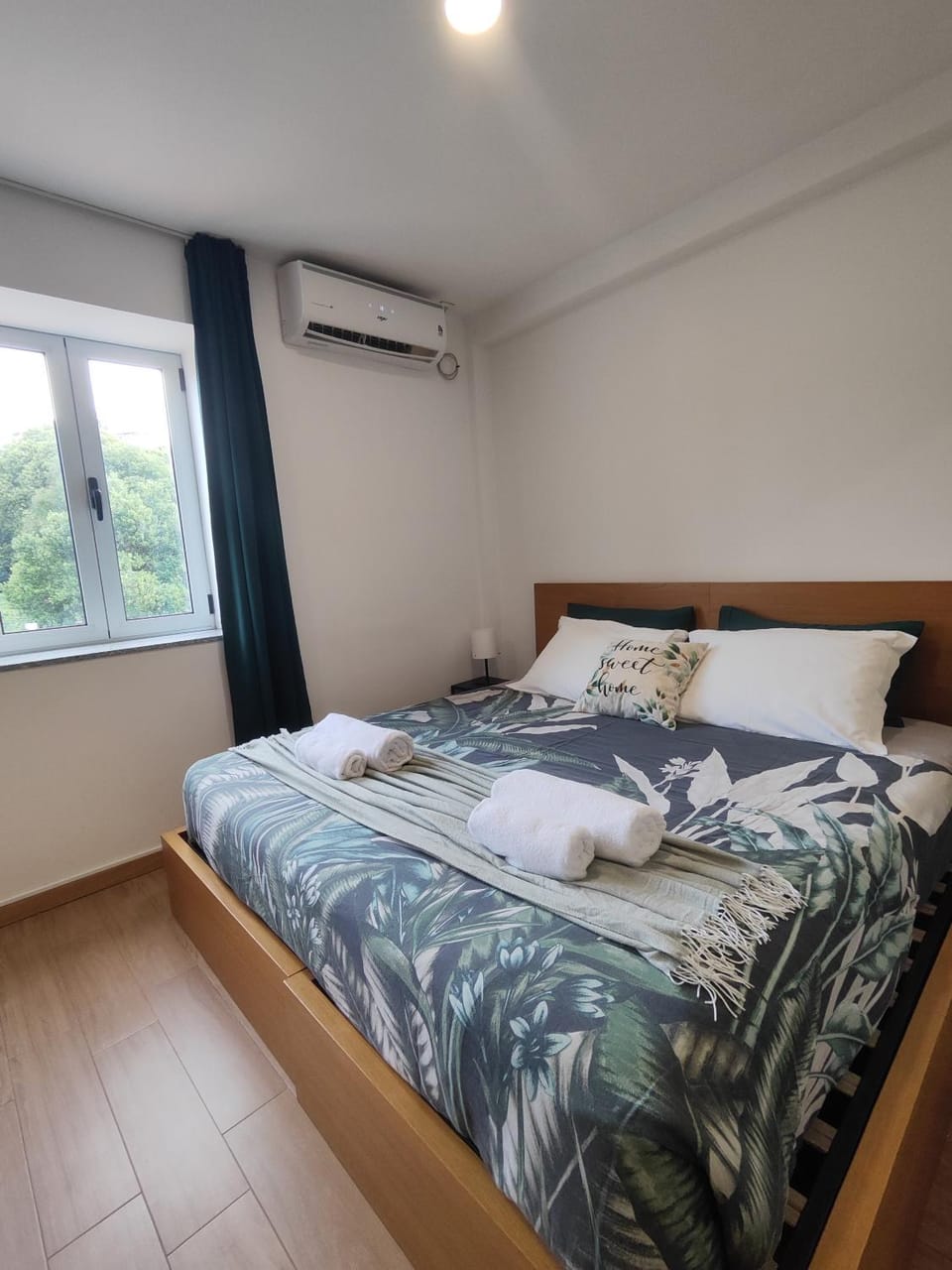 Bed, Photo of the whole room, Bedroom, towels, air conditioner