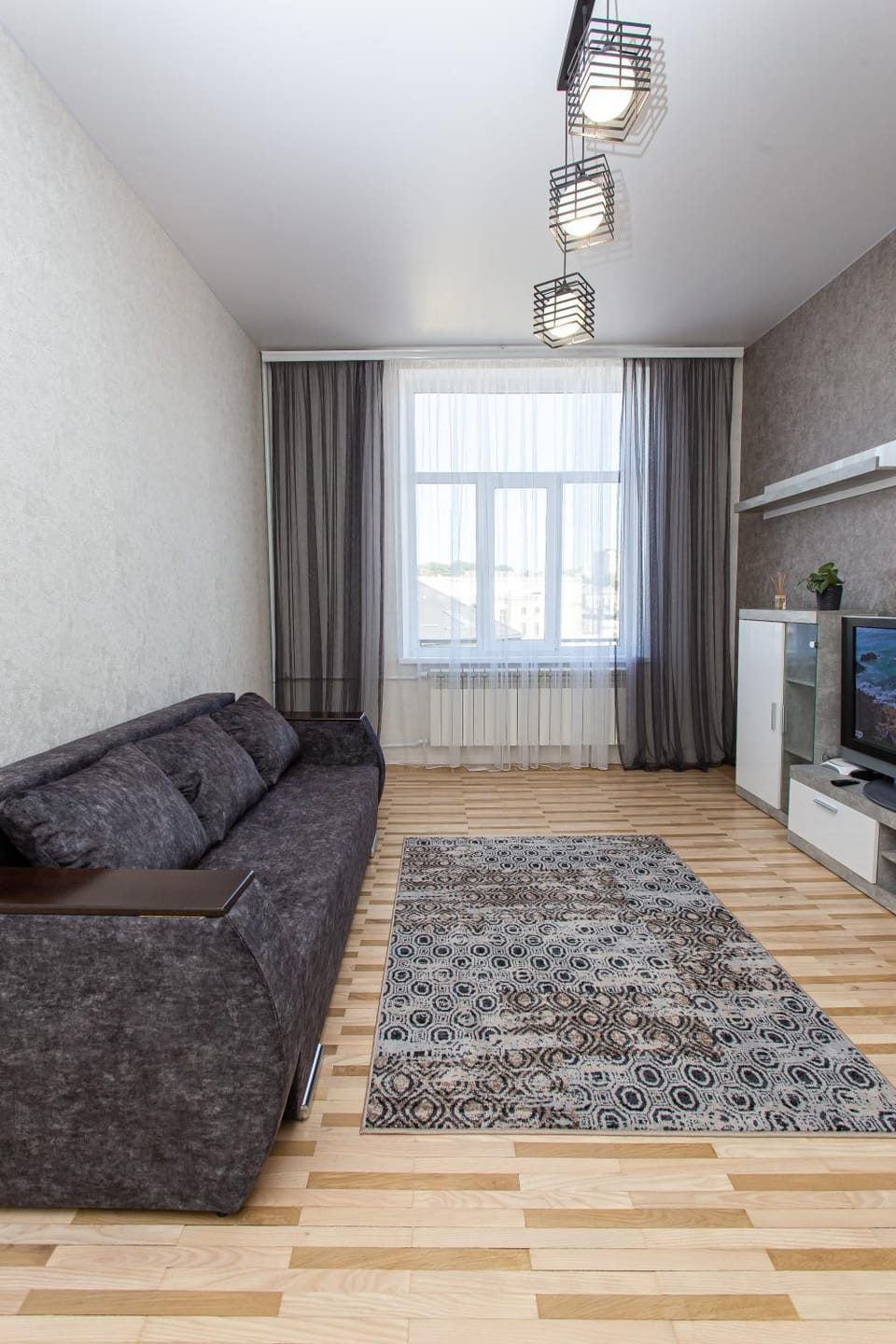 Bed, TV and multimedia, Living room, Seating area
