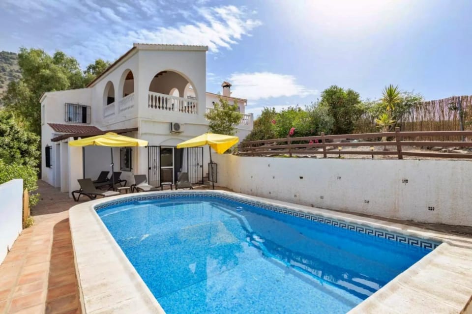Property building, Patio, Spring, Day, View (from property/room), Pool view, Swimming pool, sunbed