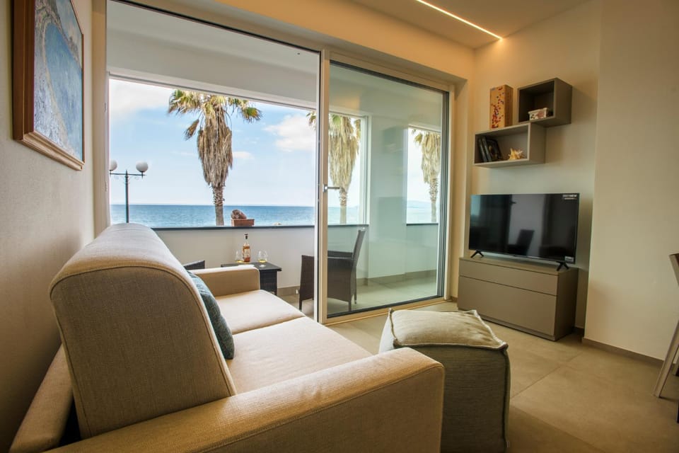 View (from property/room), Balcony/Terrace, Living room, Seating area, Sea view