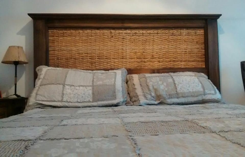 Bed, Living room, Seating area, Bedroom