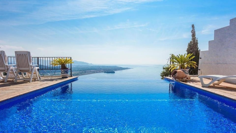 Property building, Living room, Swimming pool