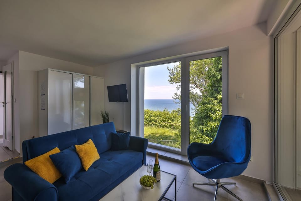Natural landscape, TV and multimedia, View (from property/room), Living room, Seating area, Landmark view, Sea view