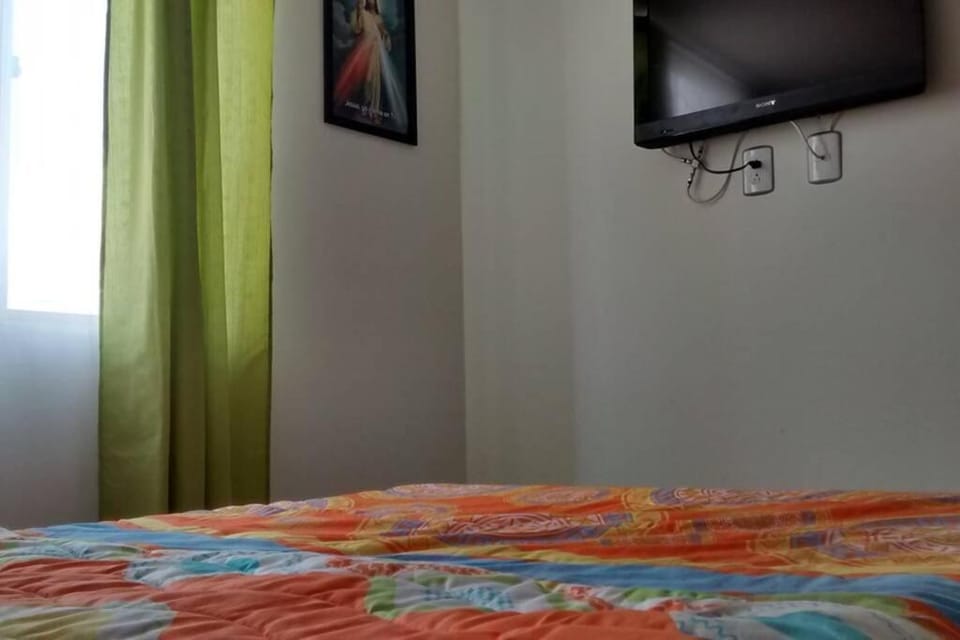 Apartamento Amoblado 3 hab 2 baños con excelente vista montañas cafeteras acogedor ambiente familiar, piscinas niños adultos, parqueadero, BBQ y ascensor con muy buena iluminación natural Apartment in Armenia