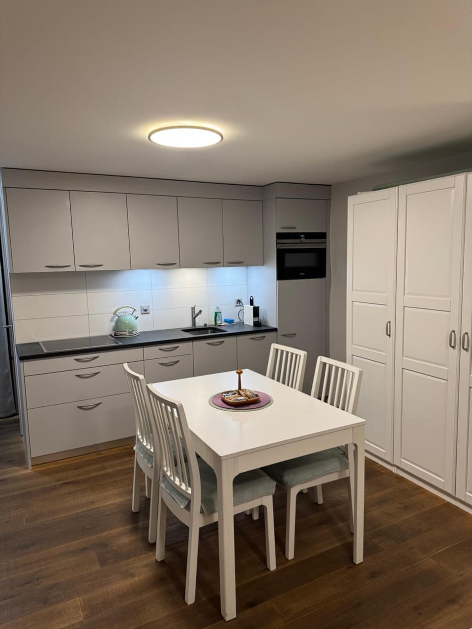 Dining area, microwave, oven, stove, kitchen