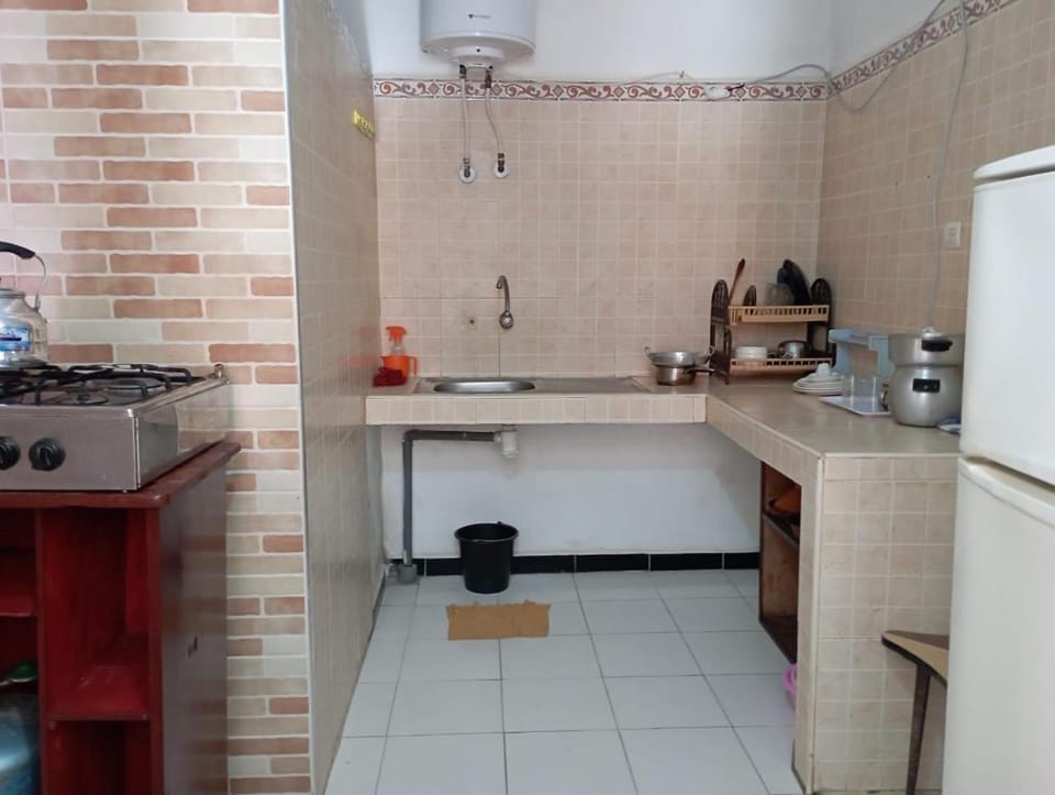 Kitchen or kitchenette, stove