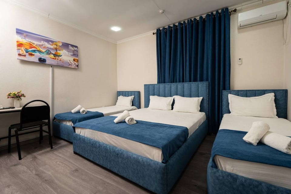 Bed, Living room, Photo of the whole room, Seating area, Bedroom, towels, air conditioner
