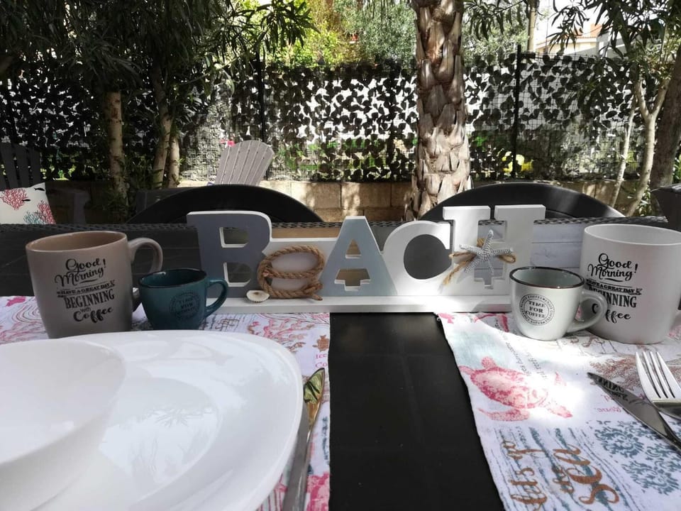 APPARTAMENTO CORALLO with PRIVATE GARDEN House in Olbia