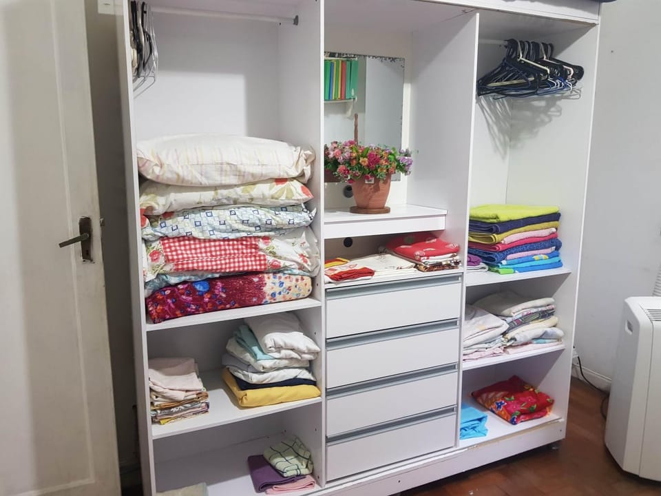 microwave, towels, towels, wardrobe