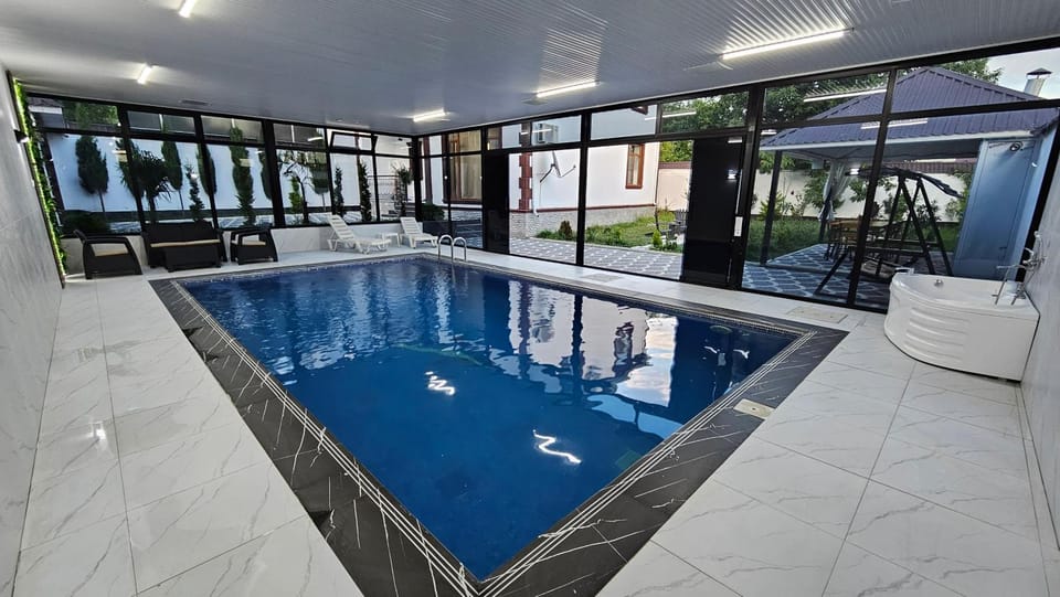 BBQ facilities, Garden, Bathroom, View (from property/room), Seating area, Garden view, Pool view, Swimming pool, Bath, fireplace, sunbed, towels