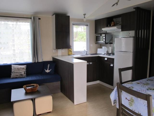 Mobil home 6 personnes - Camping les jardins du littoral Campground/ 
RV Resort in Lacanau