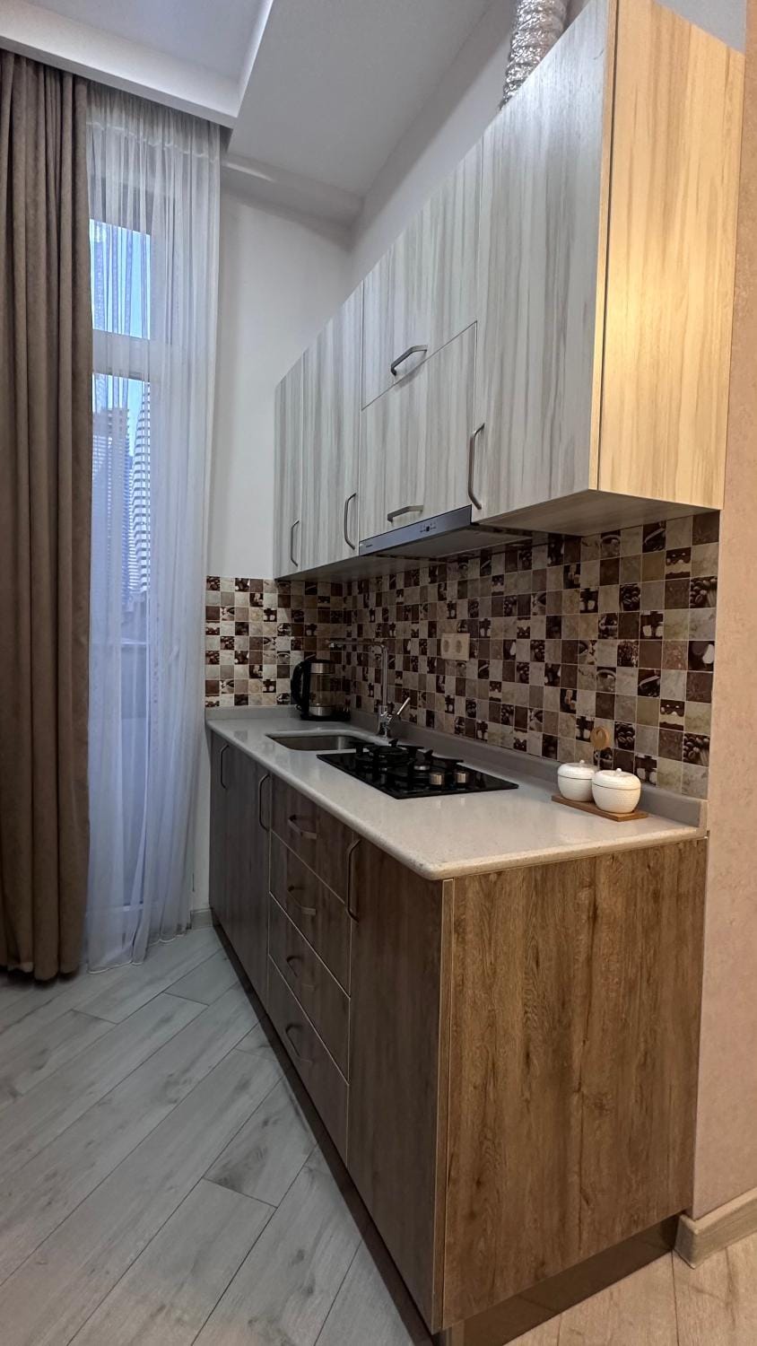 Kitchen or kitchenette, stove
